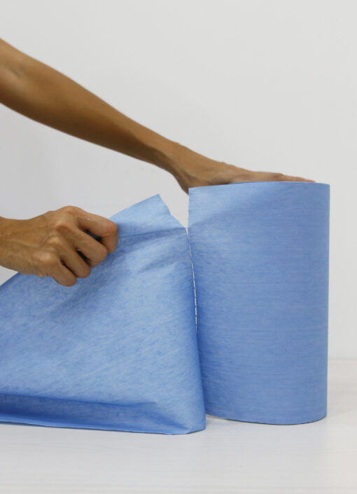 Greenwipes GW1108-M Cotton Rags - Roll Tearing off a sheet of multi purpose non woven wipes